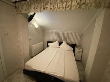 Фото Проживание в семье Apartament Mansarda г. Куртя-де-Арджеш 5