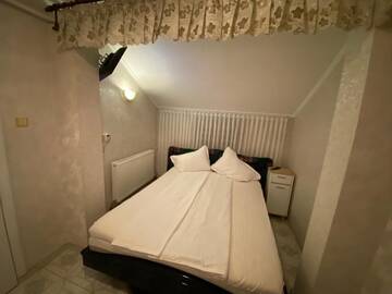 Фото номера Семейный номер с ванной комнатой Проживание в семье Apartament Mansarda г. Куртя-де-Арджеш 27
