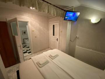 Фото номера Семейный номер с ванной комнатой Проживание в семье Apartament Mansarda г. Куртя-де-Арджеш 26